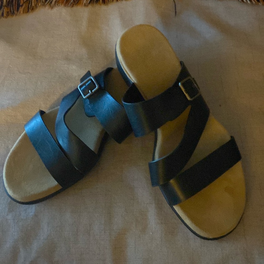 Slip on sandals with adjustable strap